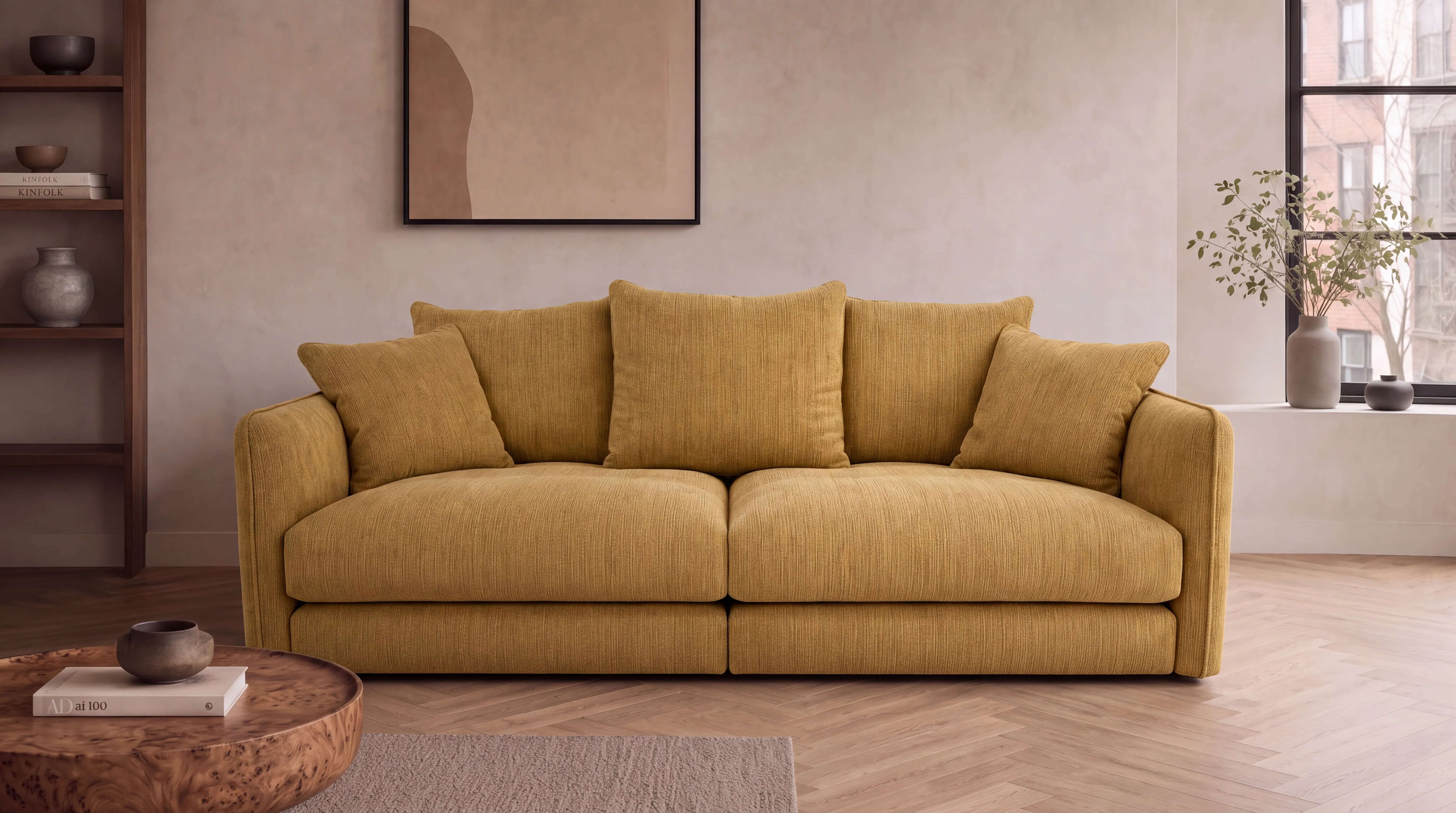 Mustard chenille sofa with scatter cushions in a bright room